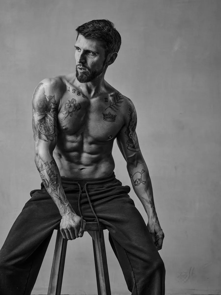 Black and White Fitness Photography: When Monochrome Makes the Muscles Pop